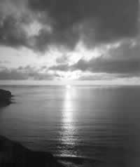 The Sun Goddess sinks towards the west where she and the Moon God make love in the darkness beneath the horizon